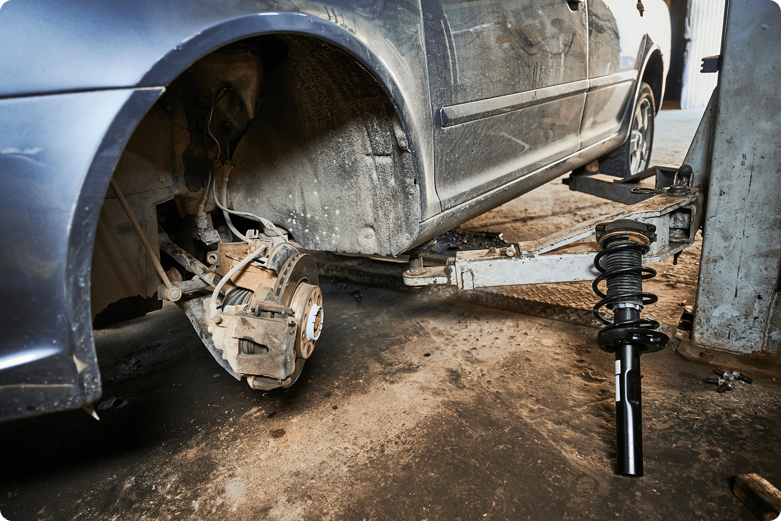 Repairman worker changing car wheel