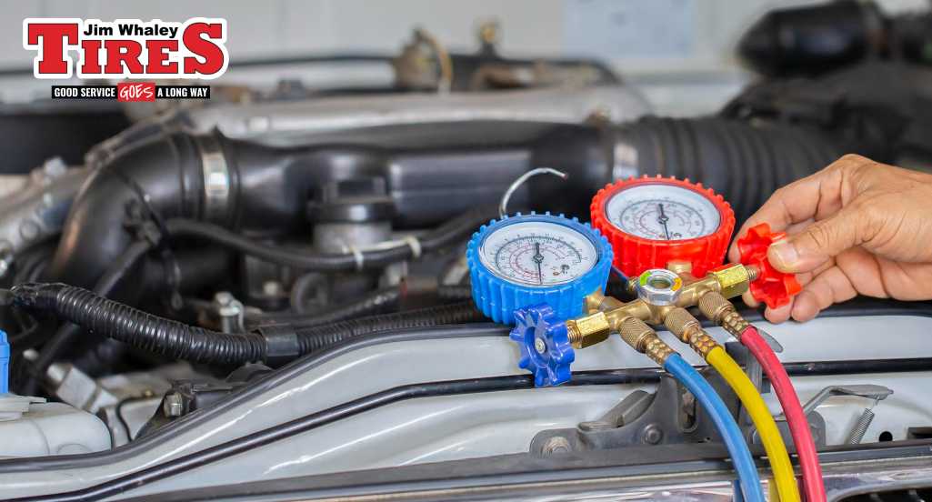 car AC repair technician diagnosing cooling issue in Dothan AL