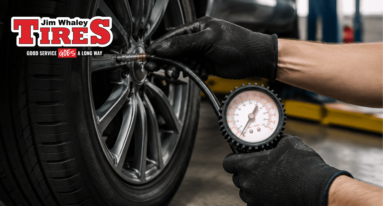 Technician performing tire rotation in Alabama at Jim Whaley Tires